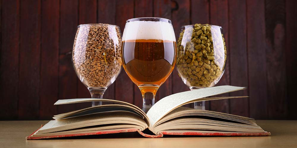 Malt, hops and a glass of beer, the raw ingredients of brewing